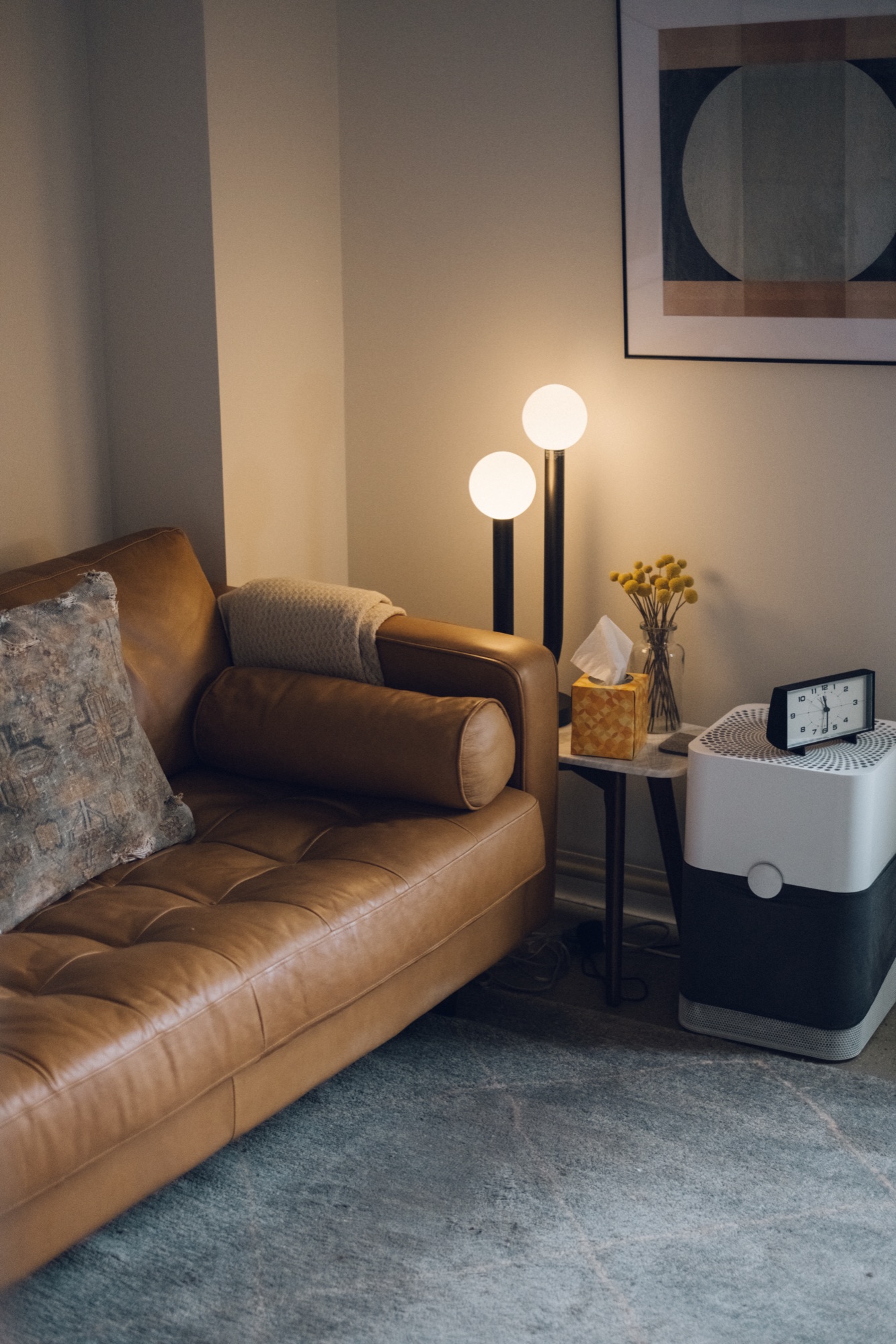 An armchair beside a window in a therapy office.